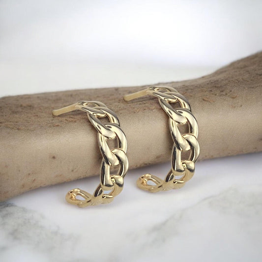 Stylish 14k yellow gold half-hoop earrings featuring a sophisticated chain link design with a high-polished finish.