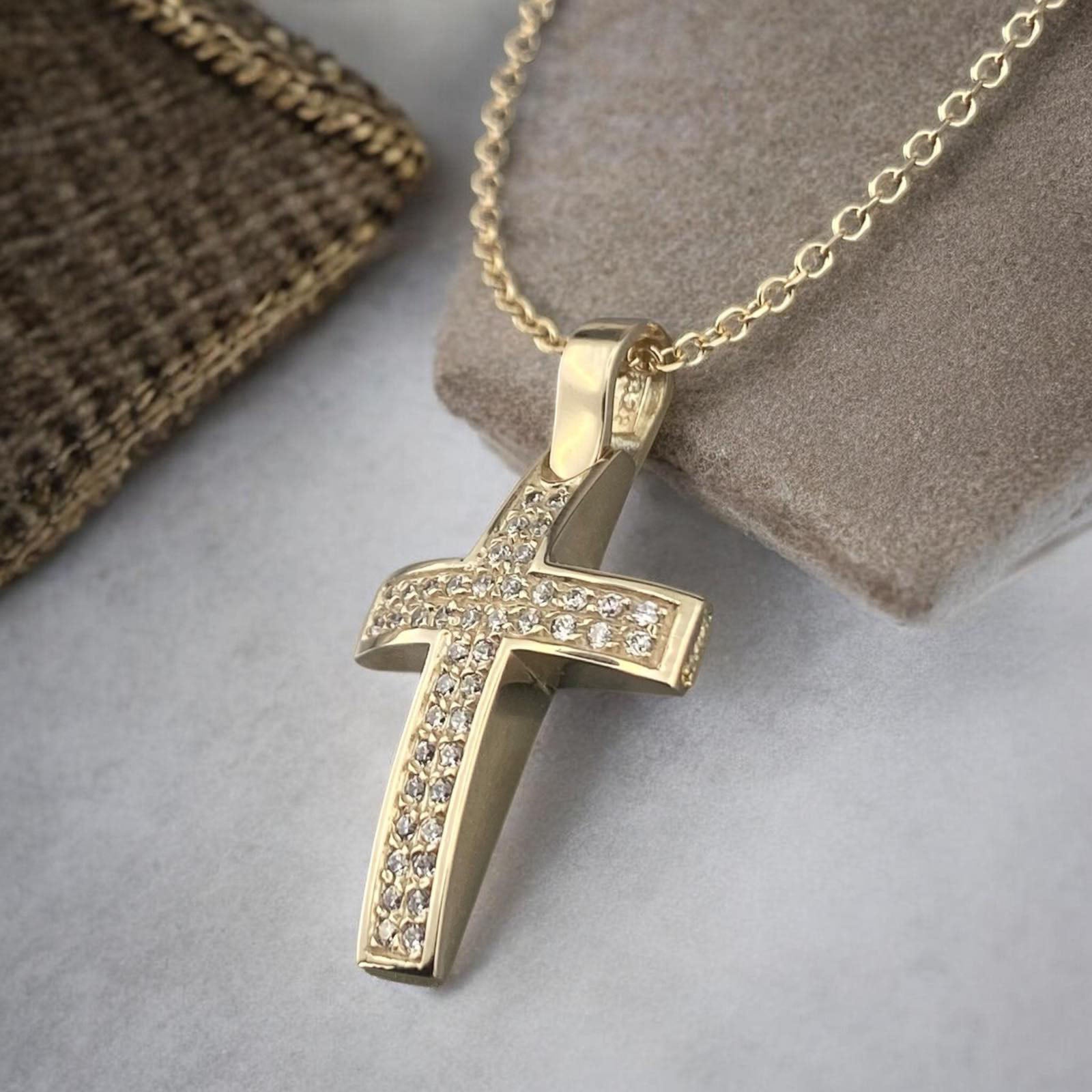 14k yellow gold cross pendant for women, featuring two parallel rows of brilliant zirconia stones.