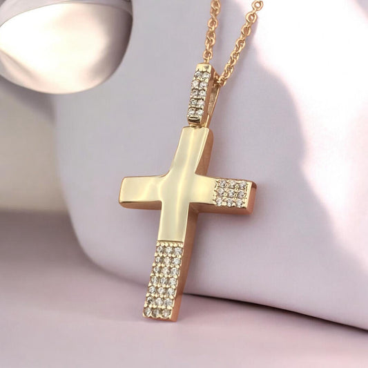 14k yellow gold cross pendant for women, featuring a modern design with sparkling zirconia stones.