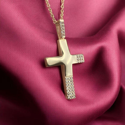 14k yellow gold cross pendant for women, featuring a modern design with sparkling zirconia stones.