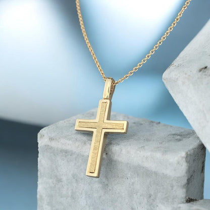 14k yellow gold cross pendant for women, featuring a modern design with sparkling zirconia stones.