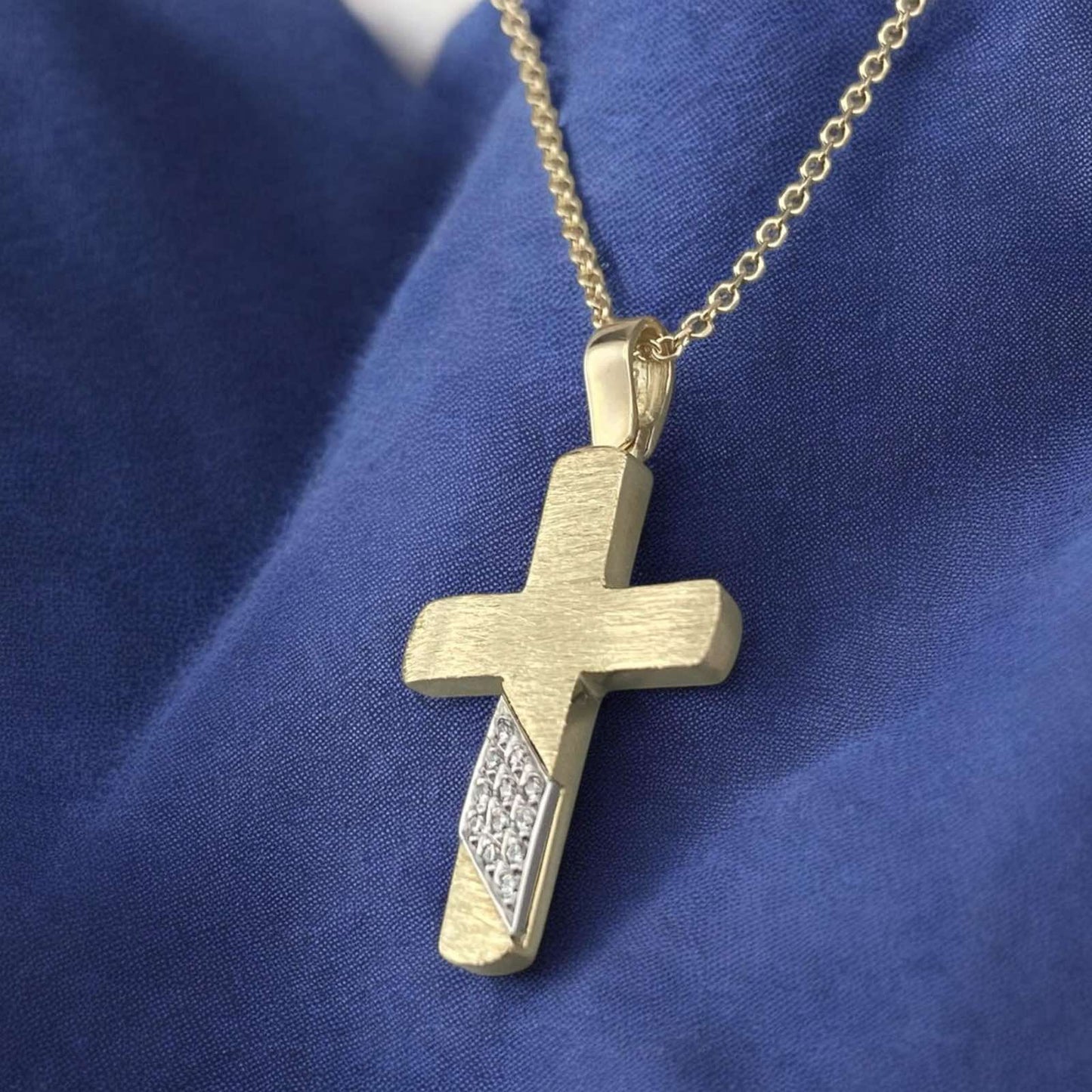 14k yellow gold cross pendant for women, featuring a unique brushed texture and sparkling zirconia stones.