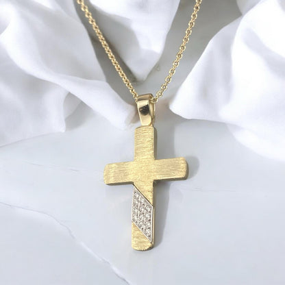 14k yellow gold cross pendant for women, featuring a unique brushed texture and sparkling zirconia stones.