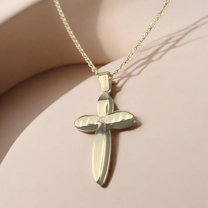14k yellow gold cross pendant for women, featuring a unique floral-inspired petal design with a central sparkling zirconia stone.