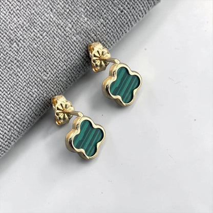 Elegant 14k yellow gold clover stud earrings featuring green malachite in a polished quatrefoil design.