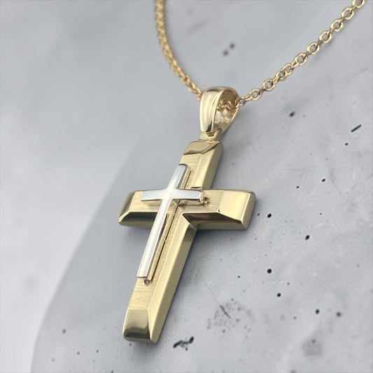 A 14K yellow gold men's cross pendant featuring a white gold inlay, combined with a unique matte and polished finish design.
