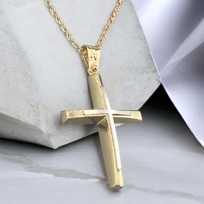 A 14K yellow gold men's cross pendant featuring a white gold inlay, combined with a unique matte and polished finish design.
