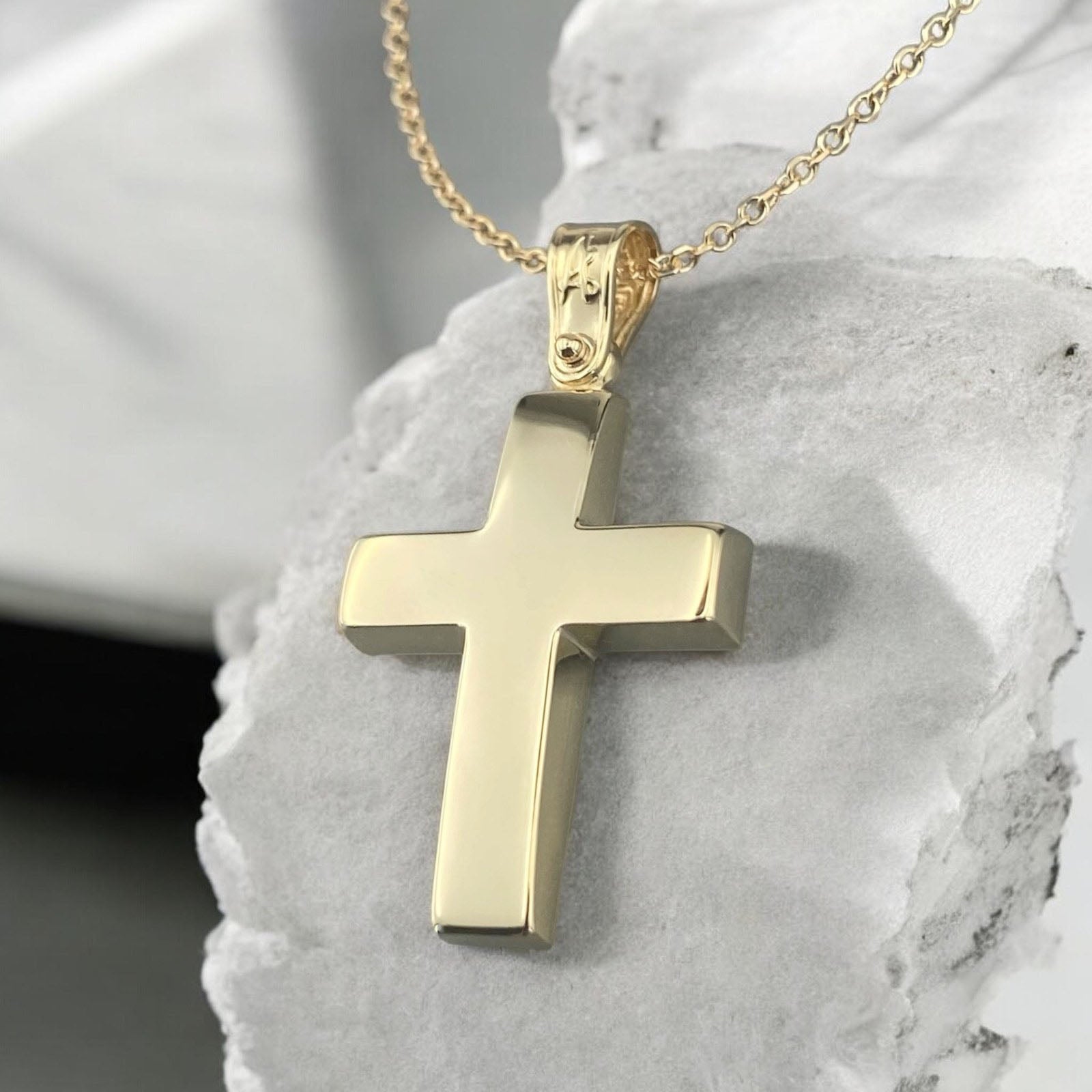 A 14K yellow gold men's cross pendant featuring a smooth, polished high-shine surface.