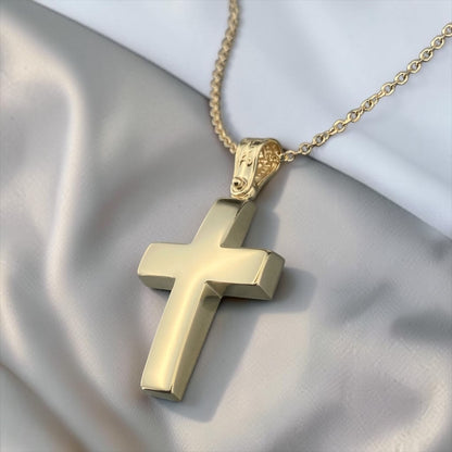 A 14K yellow gold men's cross pendant featuring a smooth, polished high-shine surface.
