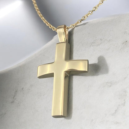 A 14K yellow gold men's cross pendant featuring a smooth, high-shine polished finish.