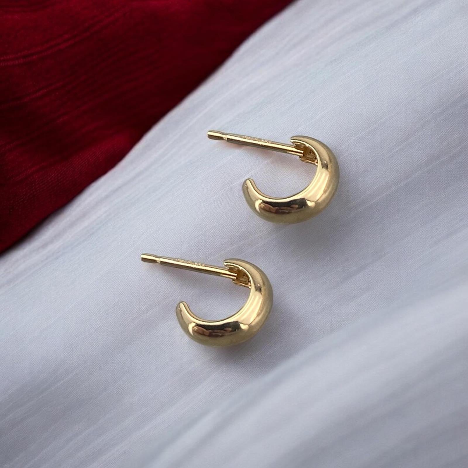 Minimalist 14k yellow gold small half-hoop stud earrings with a polished finish and secure post fastening.