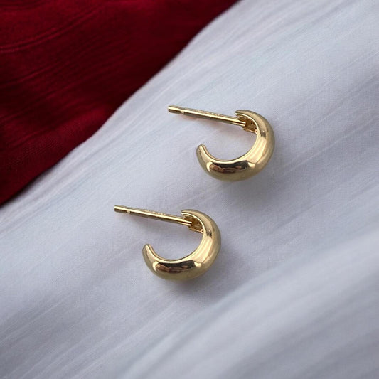 Minimalist 14k yellow gold small half-hoop stud earrings with a polished finish and secure post fastening.