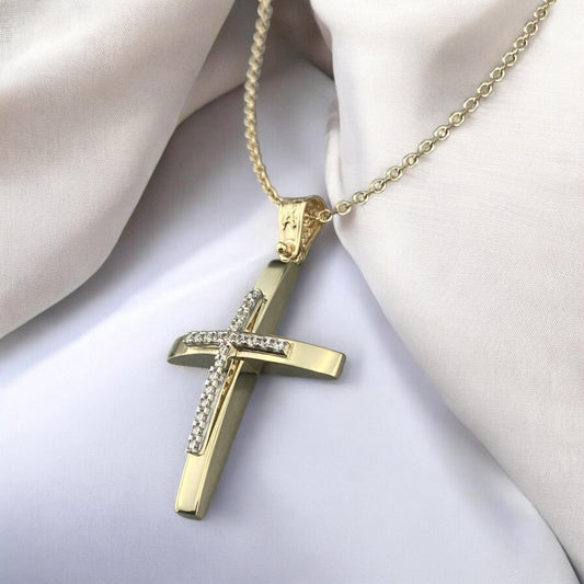 14K yellow gold cross pendant with white zirconia stones and a polished modern design