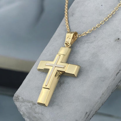 14K yellow and white gold men's cross pendant featuring a white gold inlaid cross and polished finish