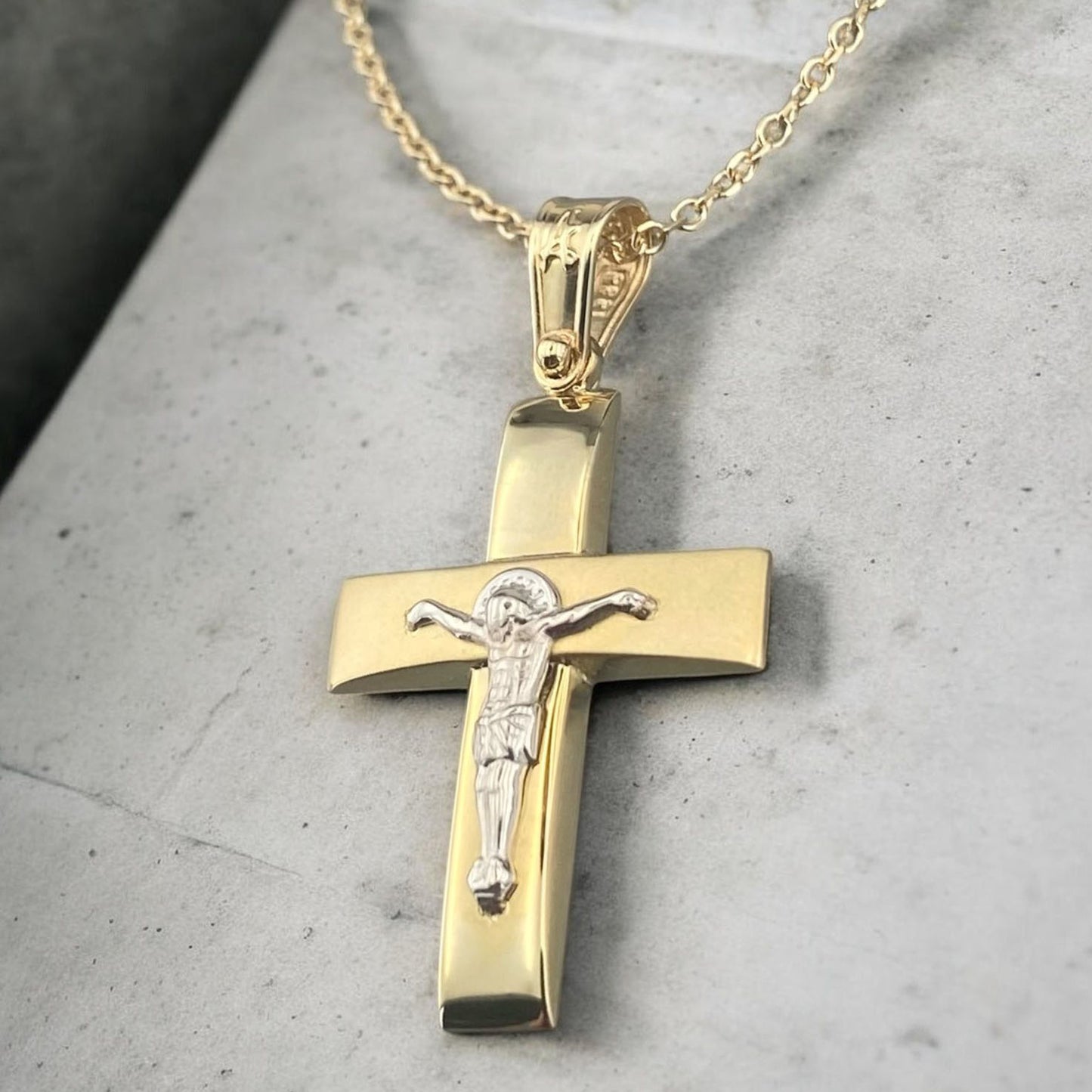 14K yellow and white gold men's cross pendant featuring a matte horizontal bar, polished vertical bar and white gold crucifix