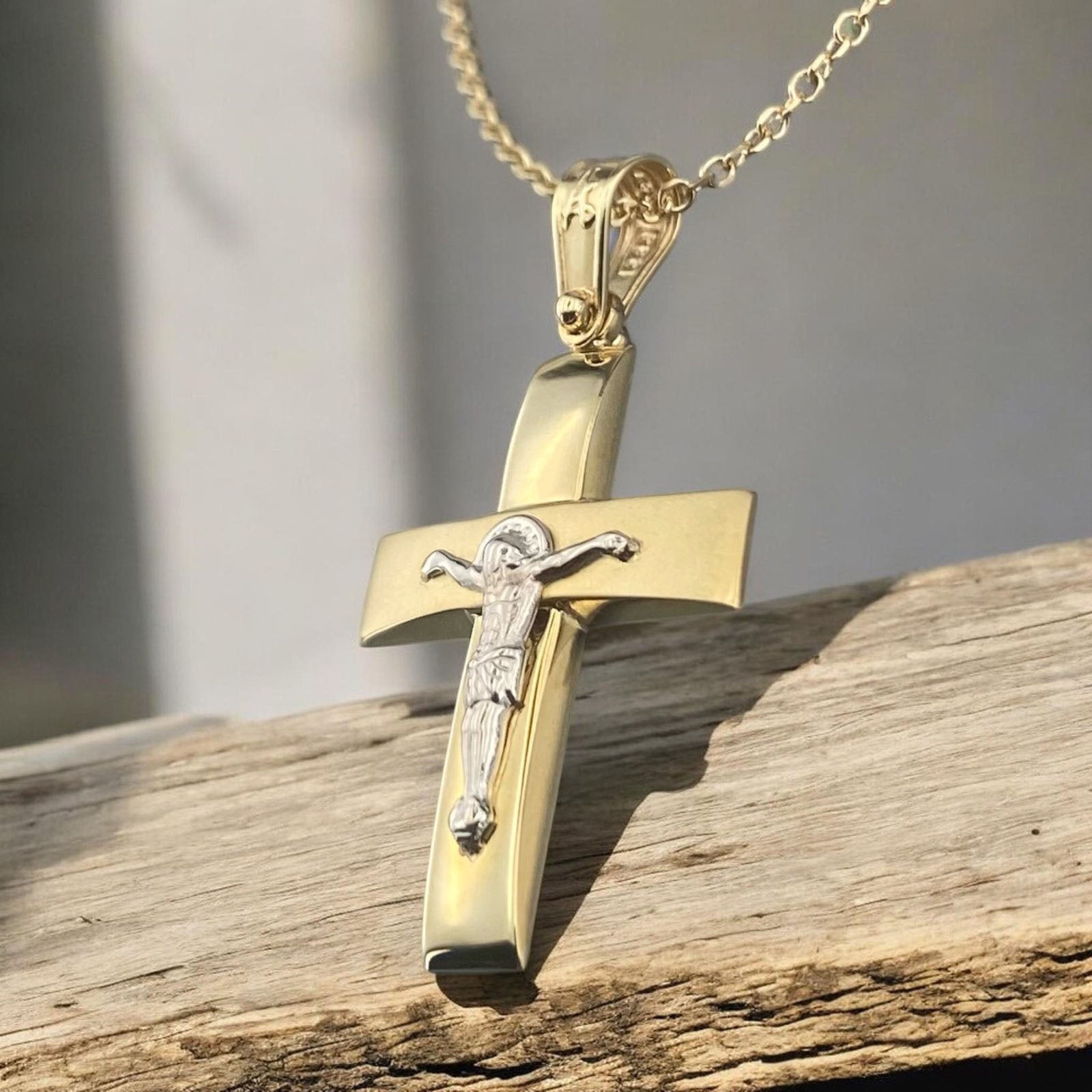14K yellow and white gold men's cross pendant featuring a matte horizontal bar, polished vertical bar and white gold crucifix